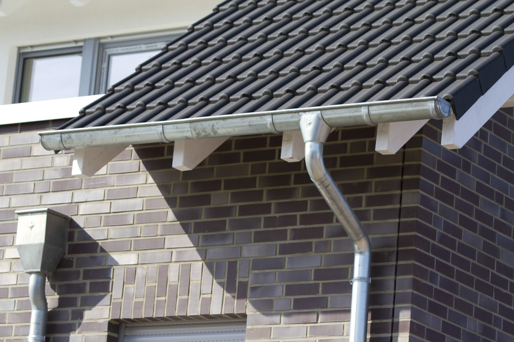 Pose et nettoyage de gouttière avec Les Compagnons Moëllo à Vernon (27200)